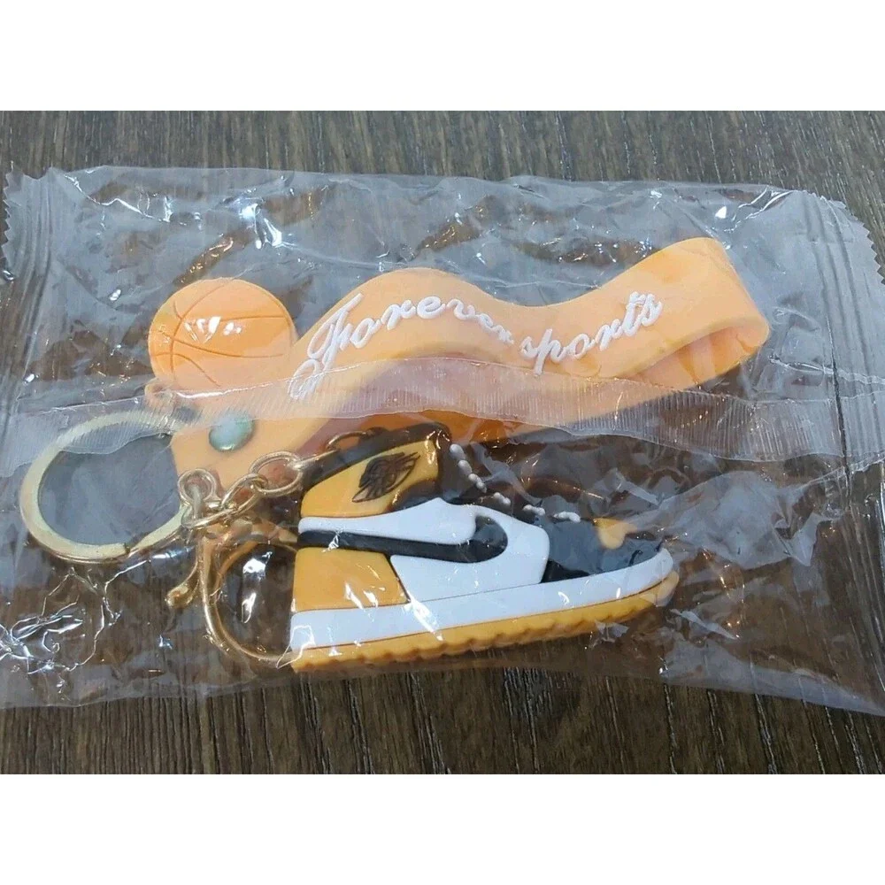 NIP Nike Air Jordan Sneaker Key Chain Yellow Black Forever Sports Basketball